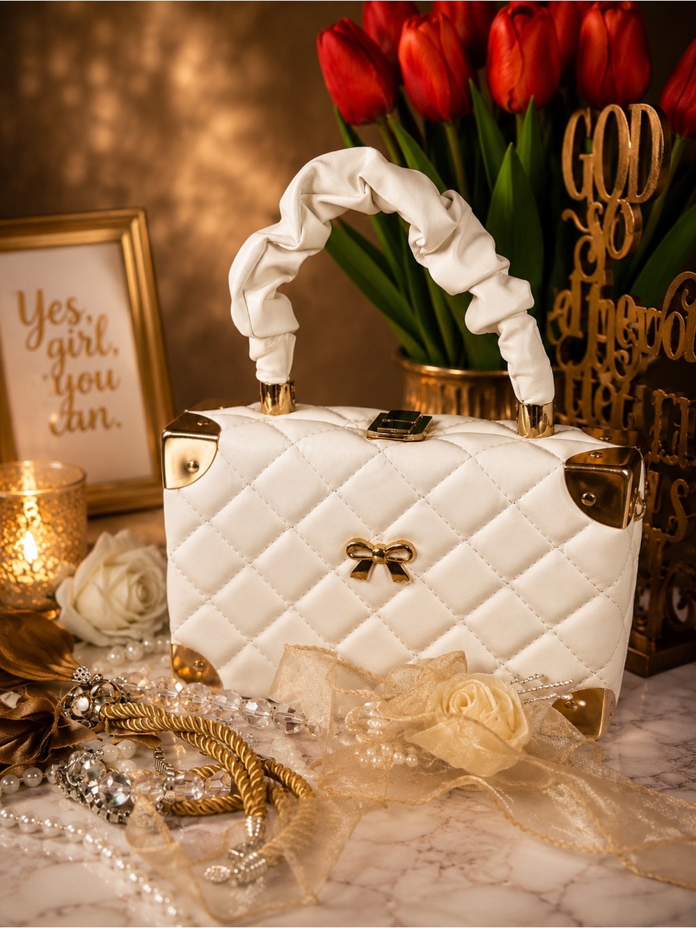 Elegant White Quilted Top-Handle Handbag with Gold Accents